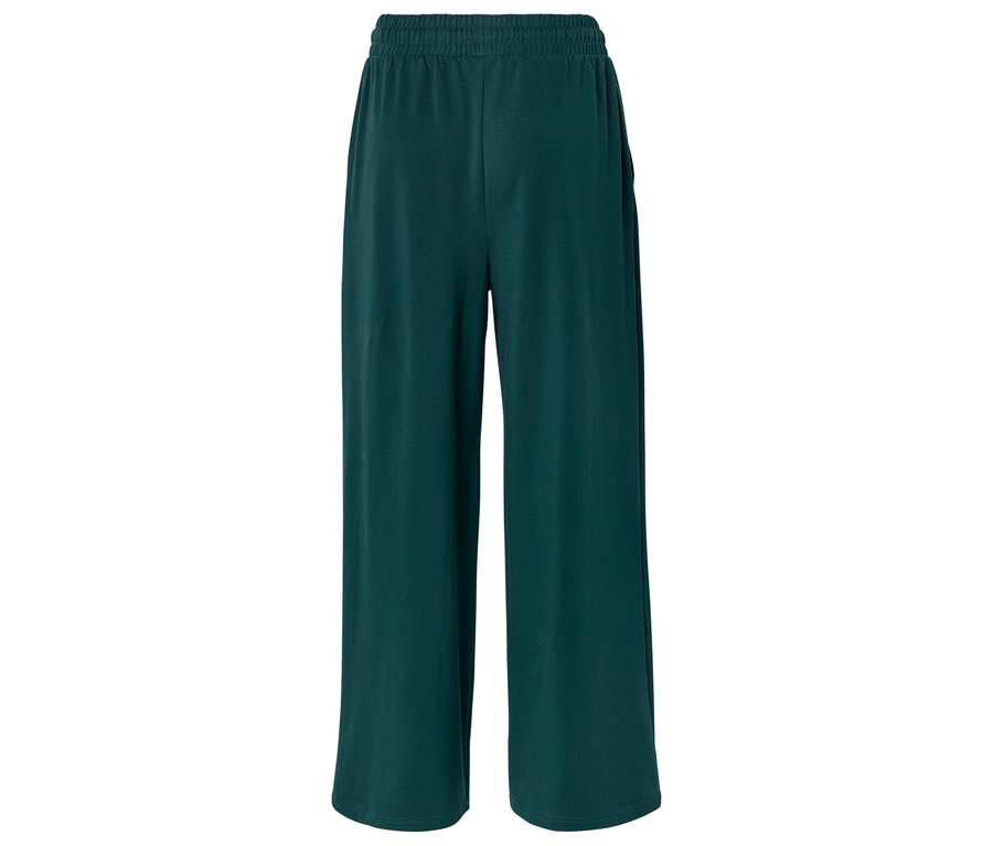 Pantalon large vert foncé avec une taille élastique sur un fond blanc.