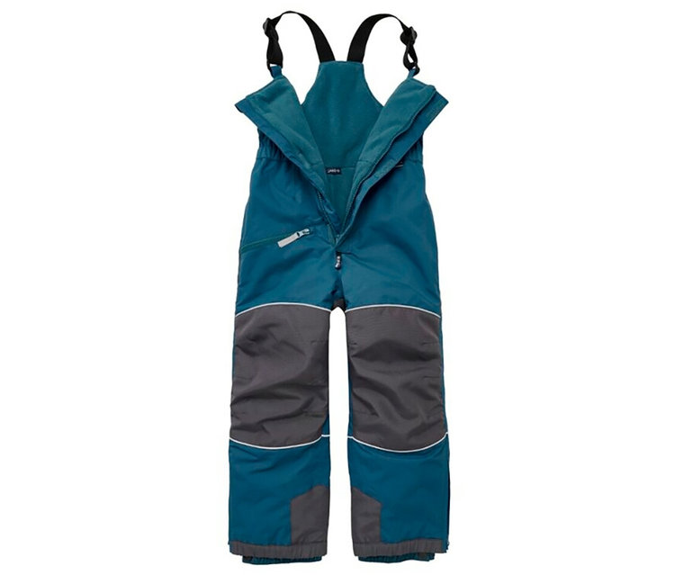 Salopette de ski pour enfant turquoise et gris foncé avec bretelles noires et fermeture éclair avant partiellement ouverte. Une bande réfléchissante blanche sépare les couleurs.