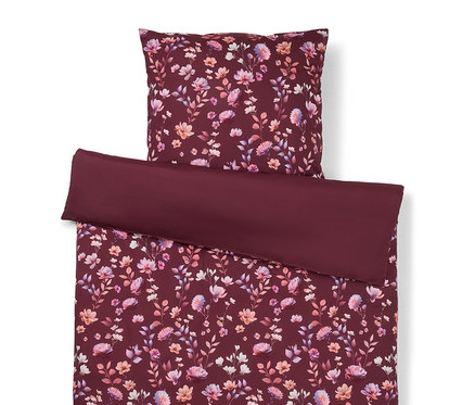 Ensemble de literie à motif floral bordeaux, comprenant une taie d'oreiller et une housse de couette.