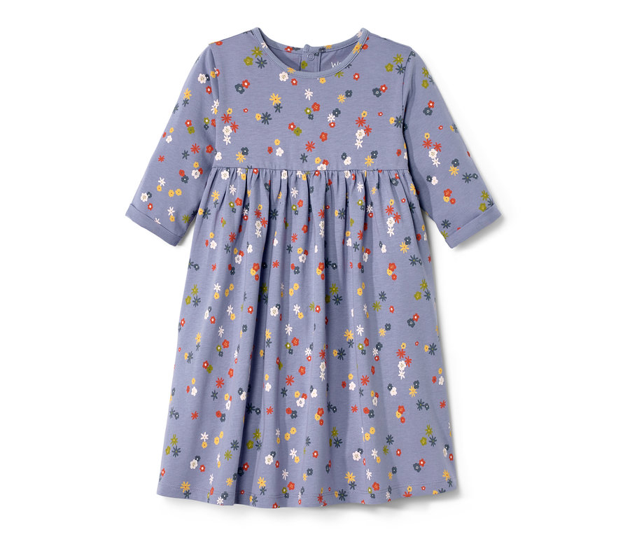 Une robe en jersey pour bébé avec un motif floral.