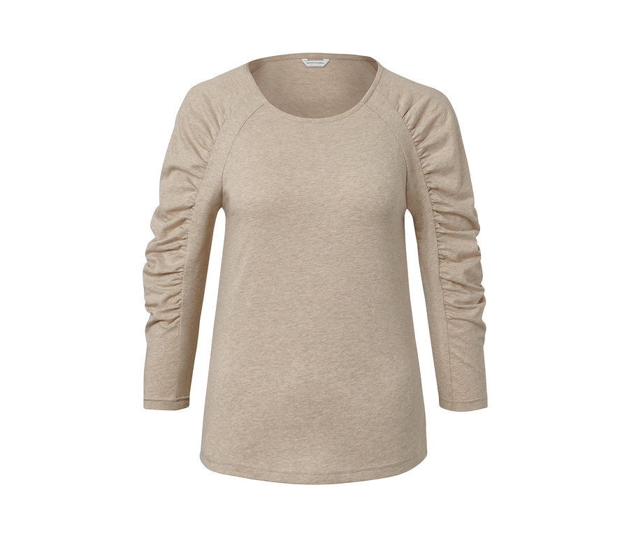 T-shirt beige à manches 3/4.