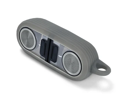 Enceinte aimantée TWS Bluetooth® grise sur fond blanc.