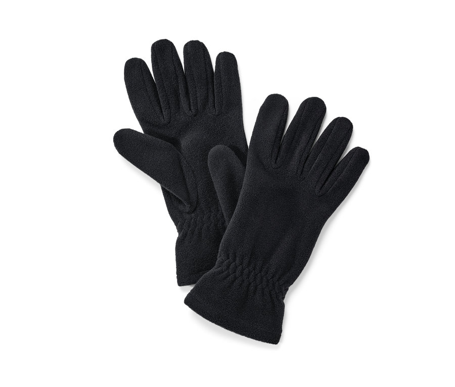 Des gants en micropolaire noirs sont posés sur un fond blanc.