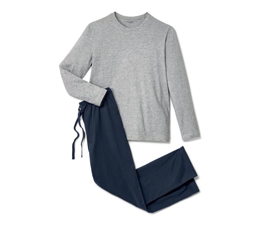 Haut de pyjama gris à manches longues et pantalon de pyjama bleu.