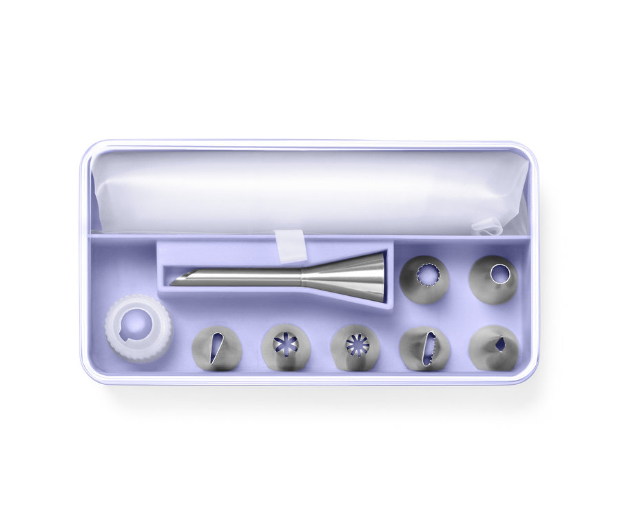 Lot de poches à douilles dans un boîtier lilas.