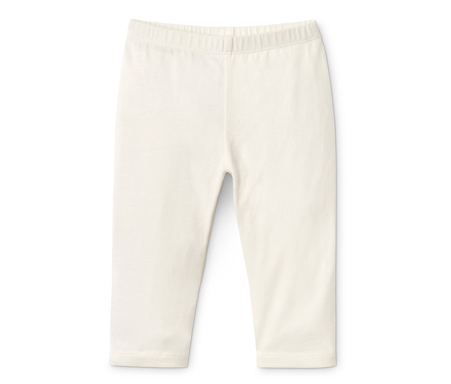 Un legging 3/4 blanc en coton bio sur fond blanc.