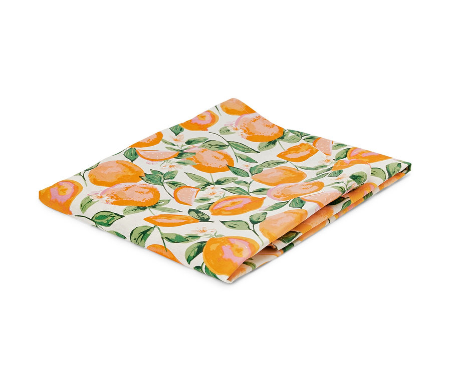 Nappe lavable pliée avec un motif d'oranges.