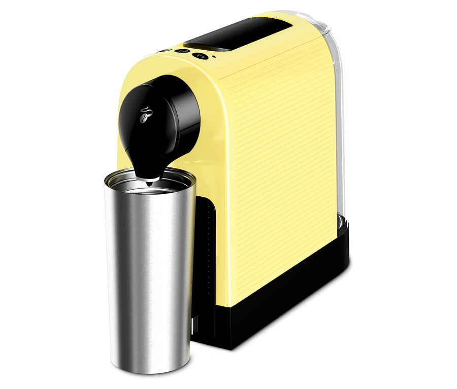 Machine à café jaune avec un thermos argenté en dessous.