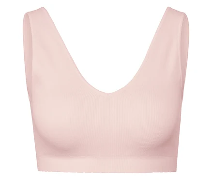 Soutien-gorge de sport rose avec décolleté en V profond.
