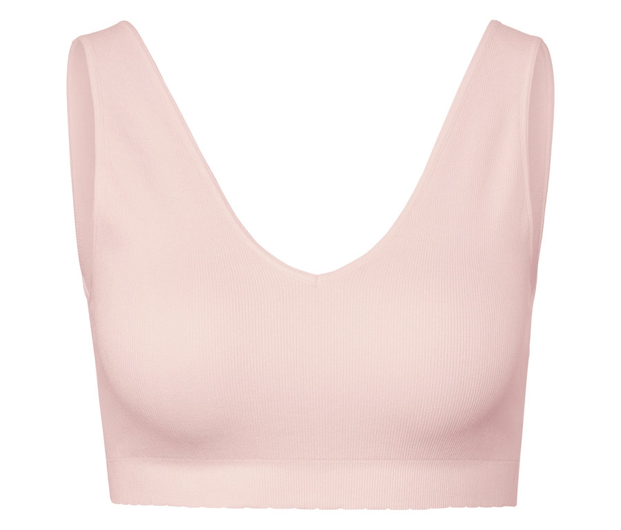 Soutien-gorge de sport rose avec décolleté en V profond.