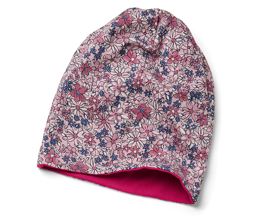 Bonnet rose à motif floral avec doublure rose.