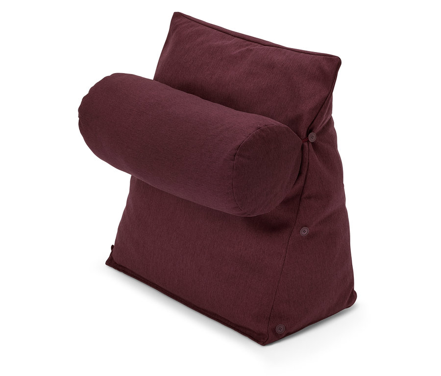 Un coussin bordeaux avec support lombaire et support cylindrique sur fond blanc.