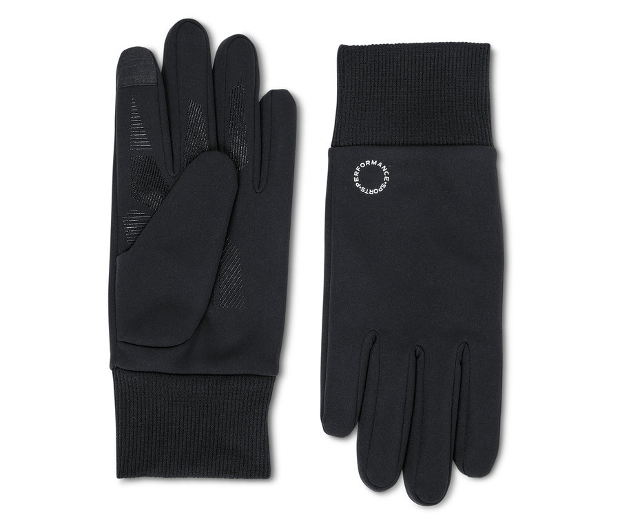 Deux gants noirs sont posés côte à côte.
