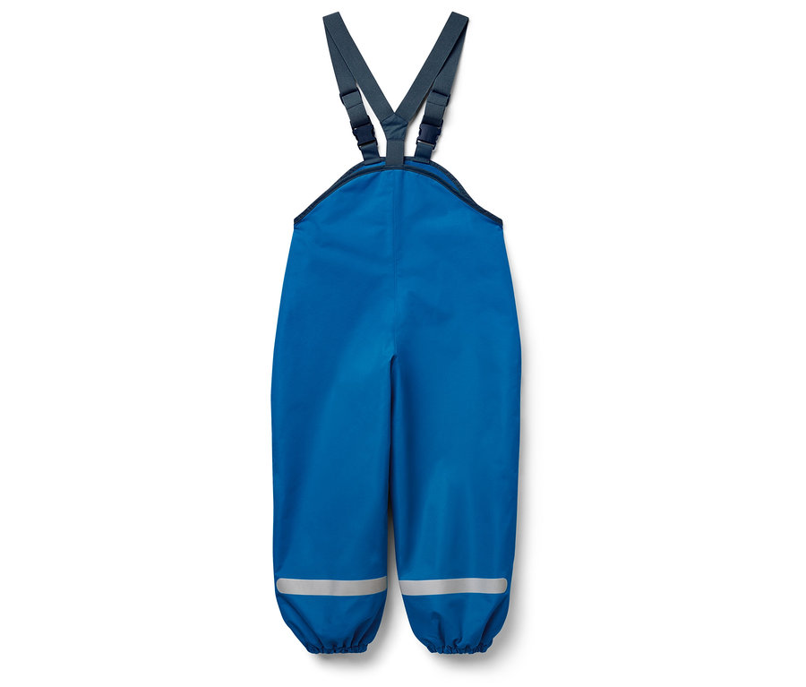 Pantalon de pluie bleu à bretelles avec des bandes réfléchissantes sur les jambes.