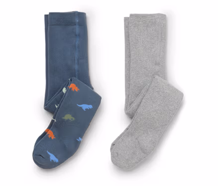 Deux collants pliés sont posés sur un fond blanc. L'un est gris, l'autre bleu avec des dinosaures.