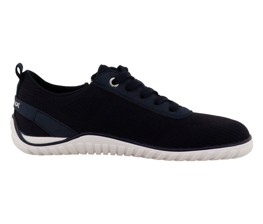 Chaussure à lacets bleu marine avec semelle blanche.