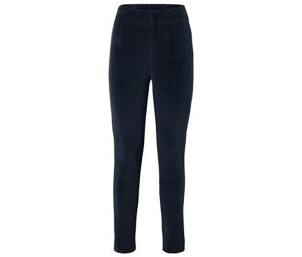 Un pantalon en velours côtelé bleu marine avec une taille élastique à plat sur le sol.