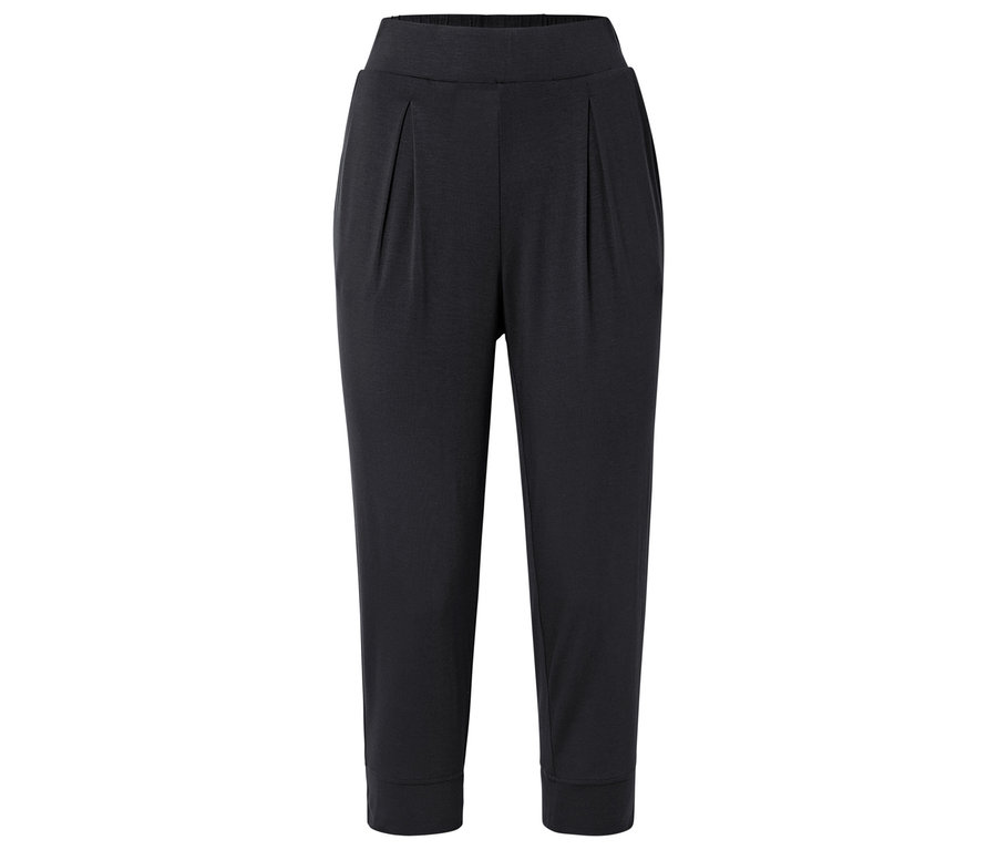 Pantalon noir avec ceinture élastique et détails froncés.