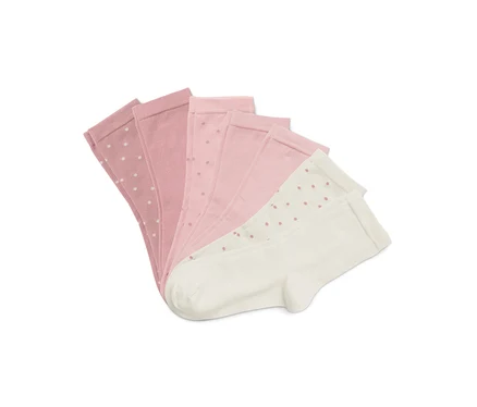 Cinq chaussettes disposées en éventail sur un fond blanc. Les chaussettes sont roses et blanches à pois.