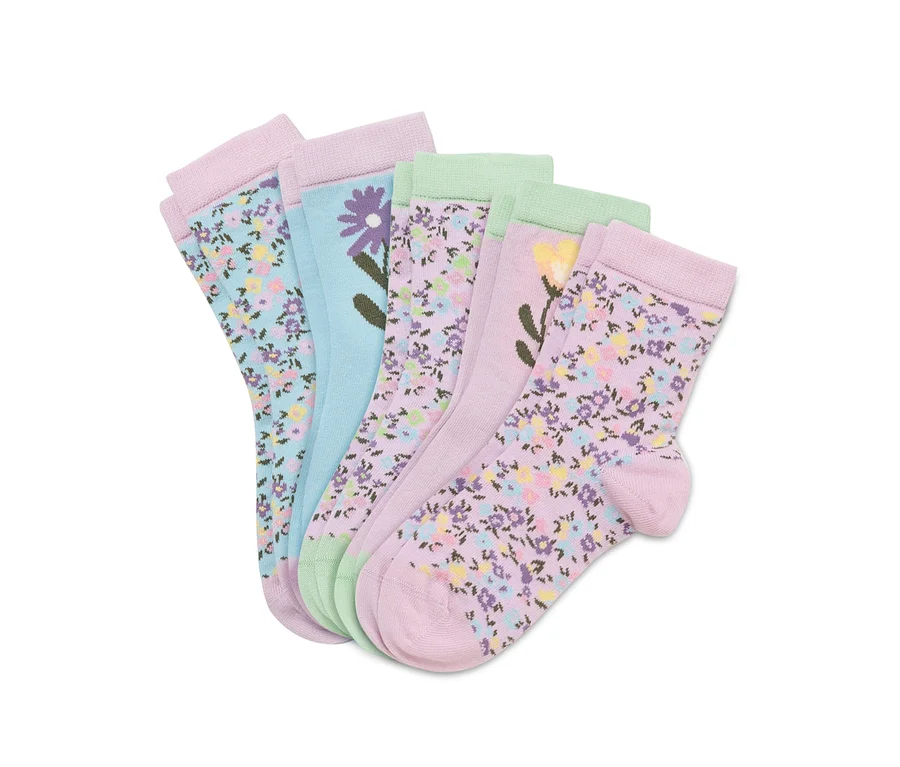 Cinq paires de chaussettes enfant avec des motifs de fleurs.