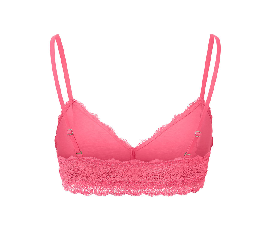 Gros plan d'une brassière en dentelle rose.