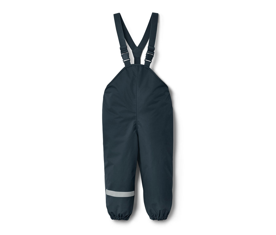 Pantalon imperméable bleu foncé pour tout-petit avec bretelles et bande réfléchissante sur la jambe.