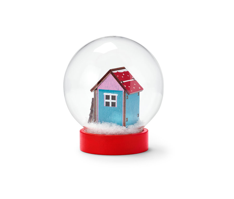 Boule à neige à LED avec maison bleue.