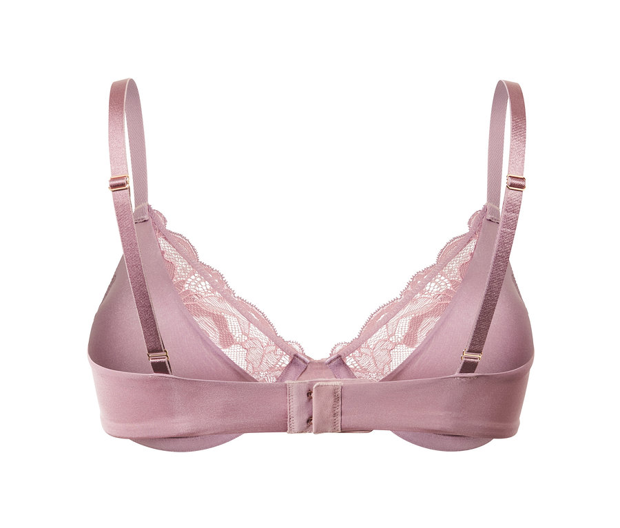 Gros plan de l'arrière d'un soutien-gorge à armatures rose avec détails en dentelle.