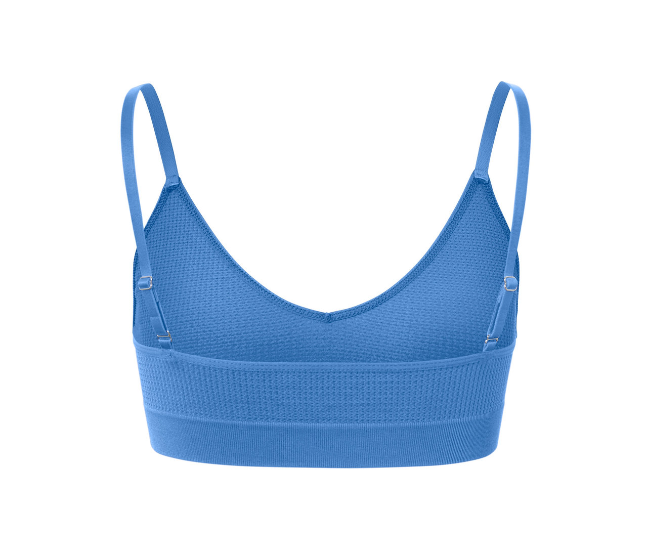 Gros plan d'une brassière bleu sans coutures avec structure et bretelles réglables.