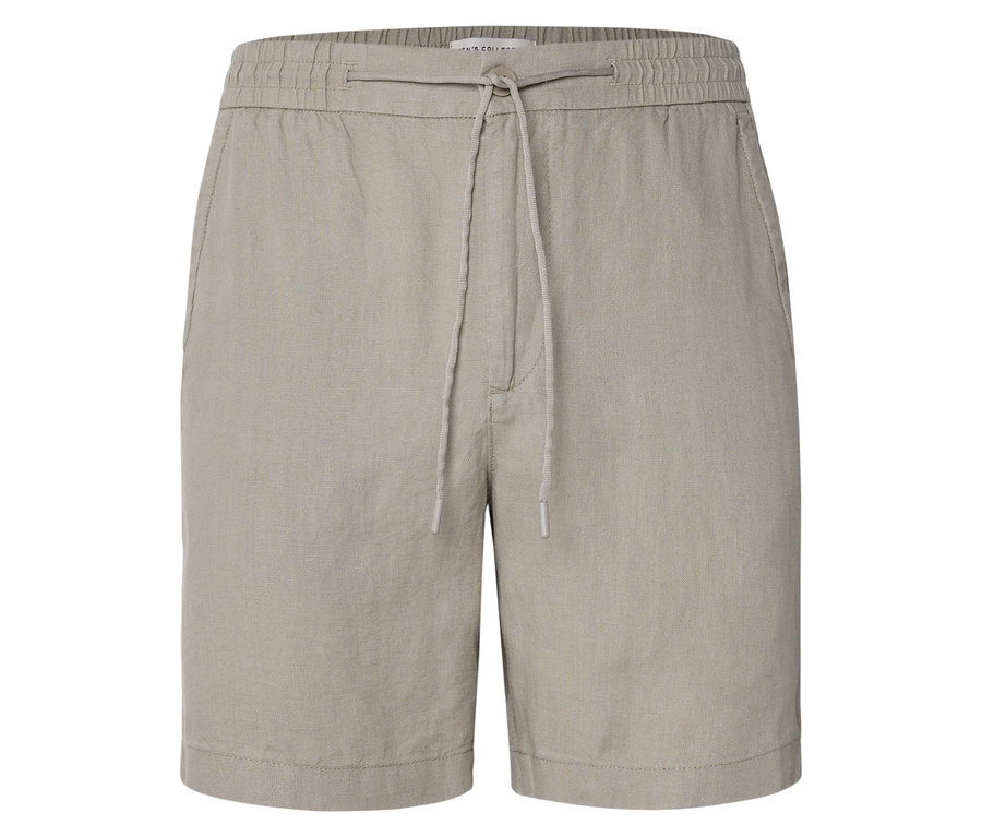 Gros plan sur un short beige avec cordon de serrage.