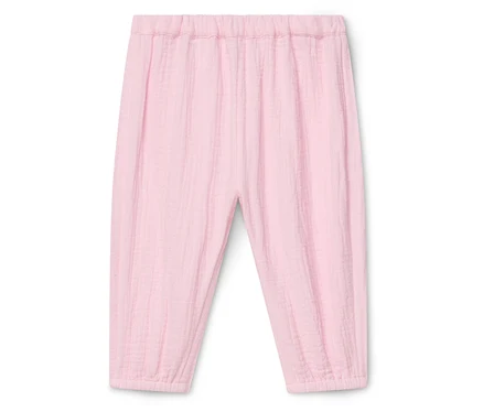 Pantalon rose ample avec taille élastique et chevilles élastiquées.