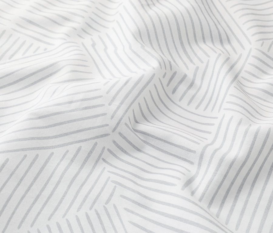 Gros plan d'un tissu blanc avec des lignes grises.