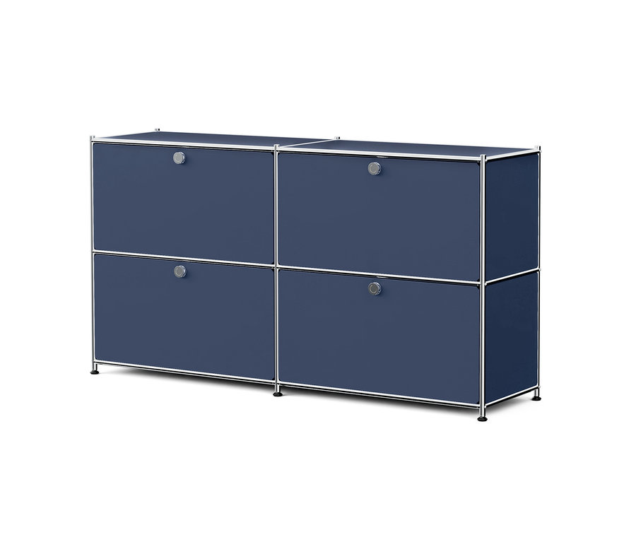Un meuble modulaire bleu foncé avec un cadre argenté, composé de quatre compartiments avec portes et poignées rondes argentées.