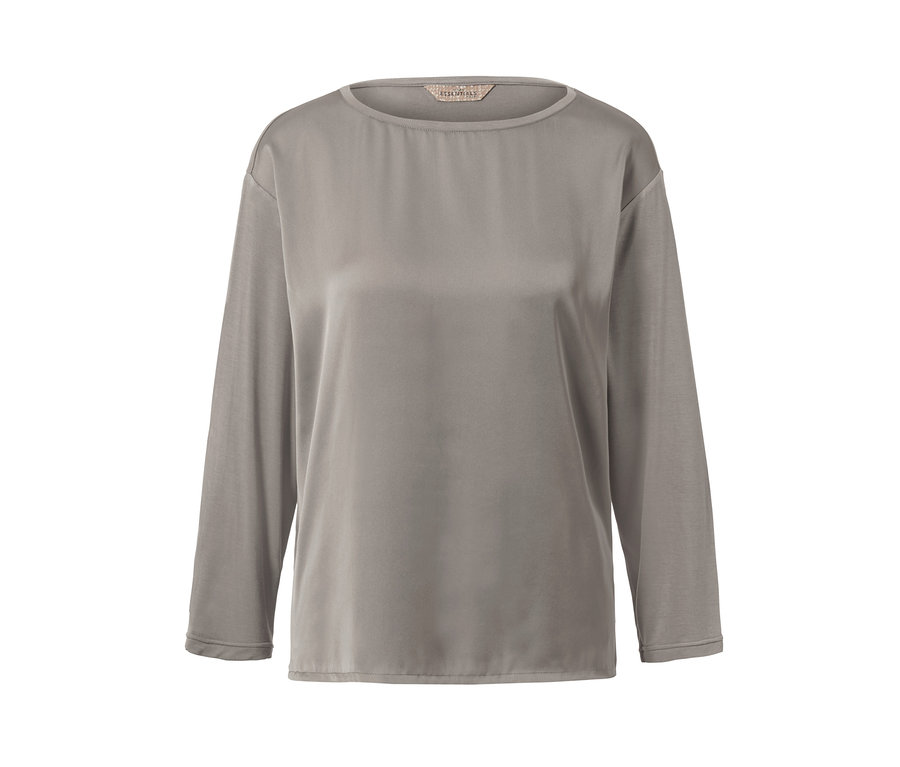 Blouse bimatière grise à manches longues.