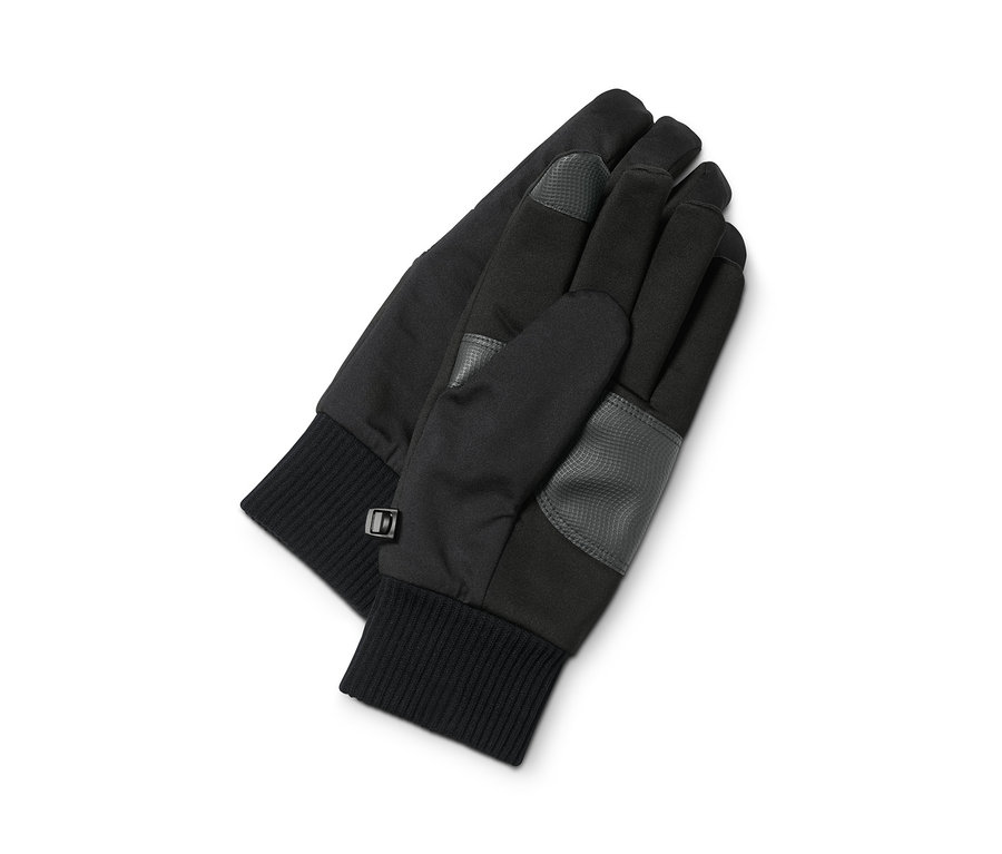 Deux gants en softshell posés sur un fond blanc.