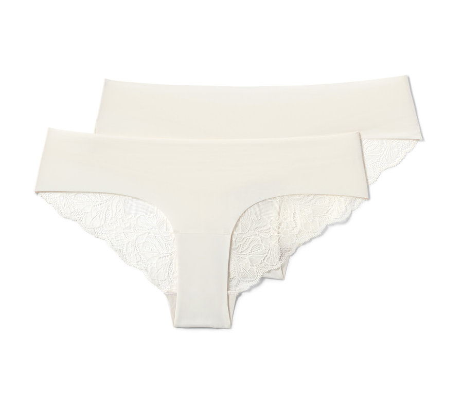 Deux slips brésiliens Magic Cut crème avec de la dentelle.