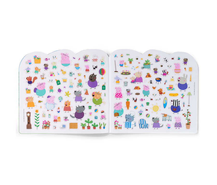 Livre ouvert avec de nombreux autocollants sur le thème de Peppa Pig.