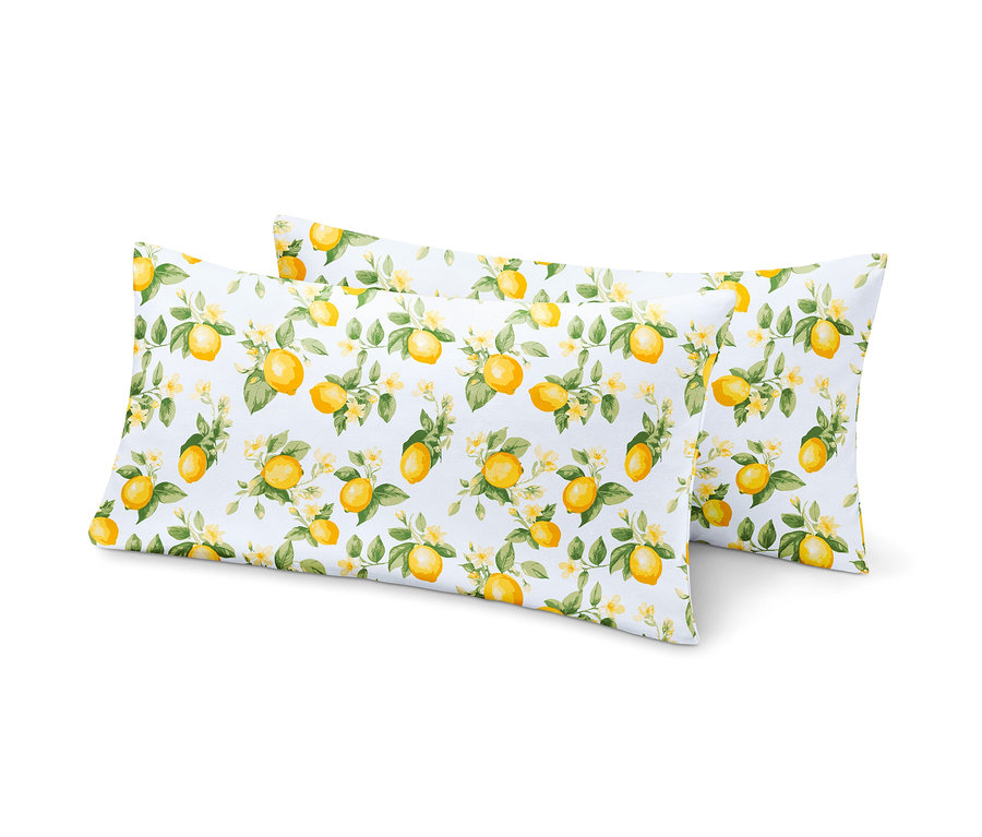 Deux taies d'oreiller en jersey à motif citron superposées.