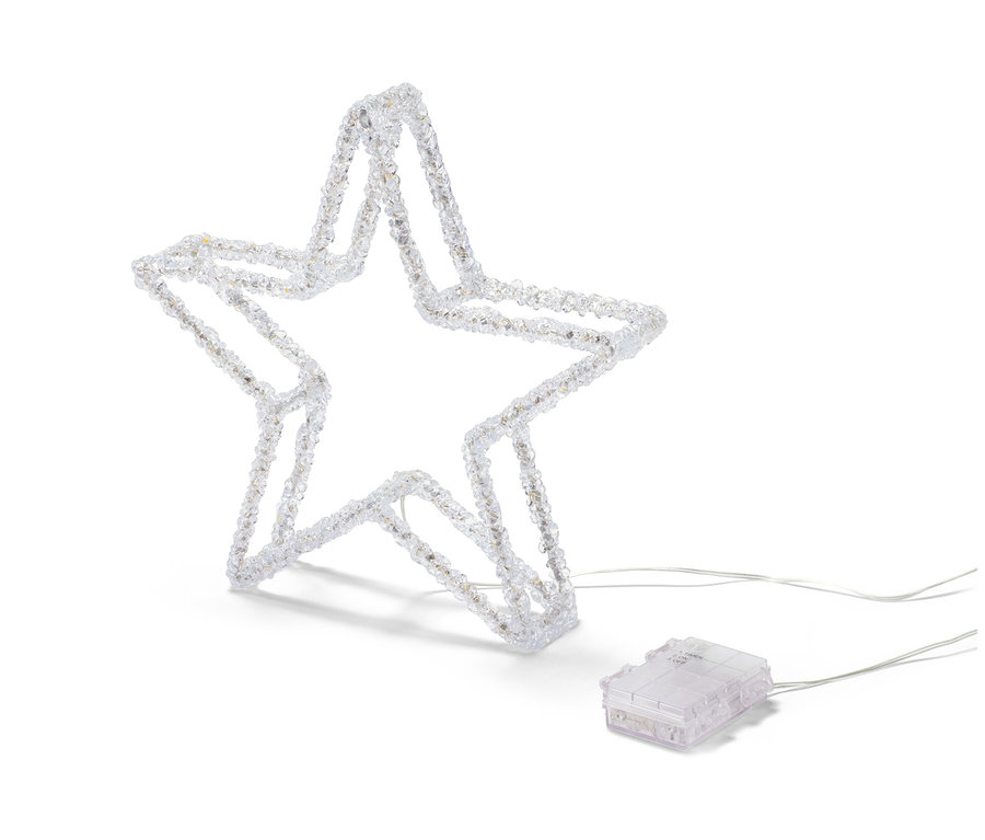 Une étoile décorative à LED est posée sur un fond blanc.