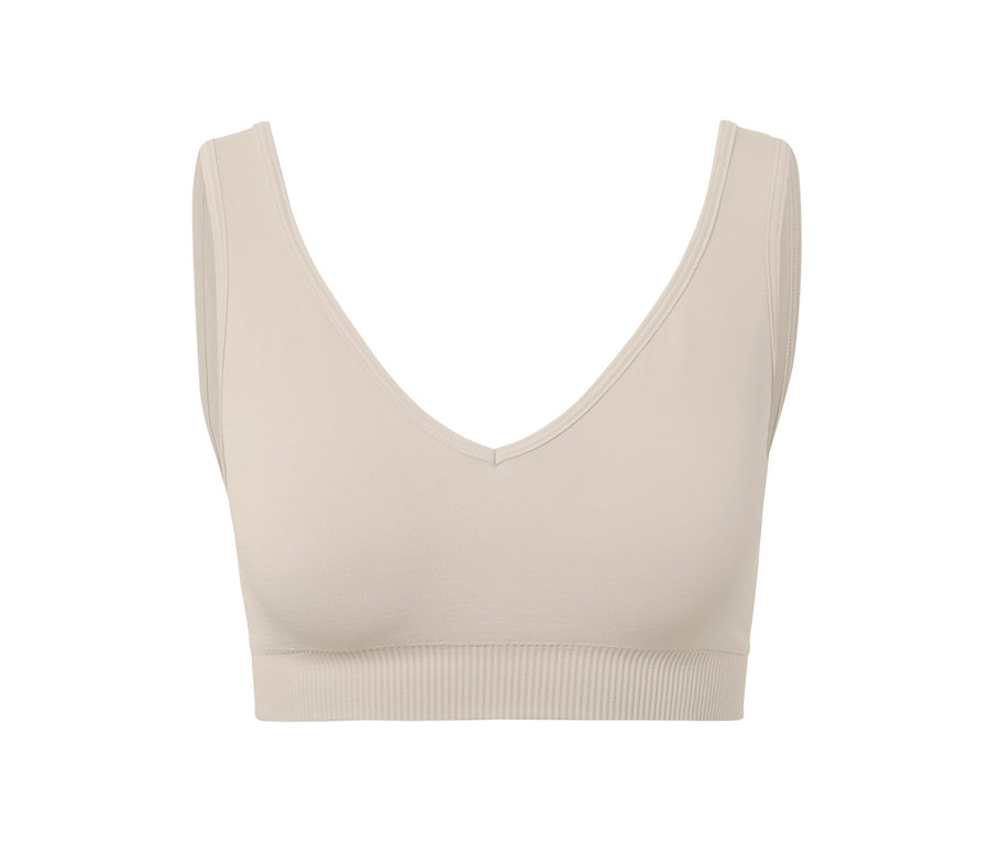 Brassière de sport sans coutures blanc cassé.