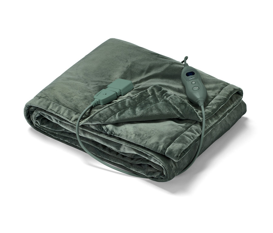 Couverture chauffante pliée.