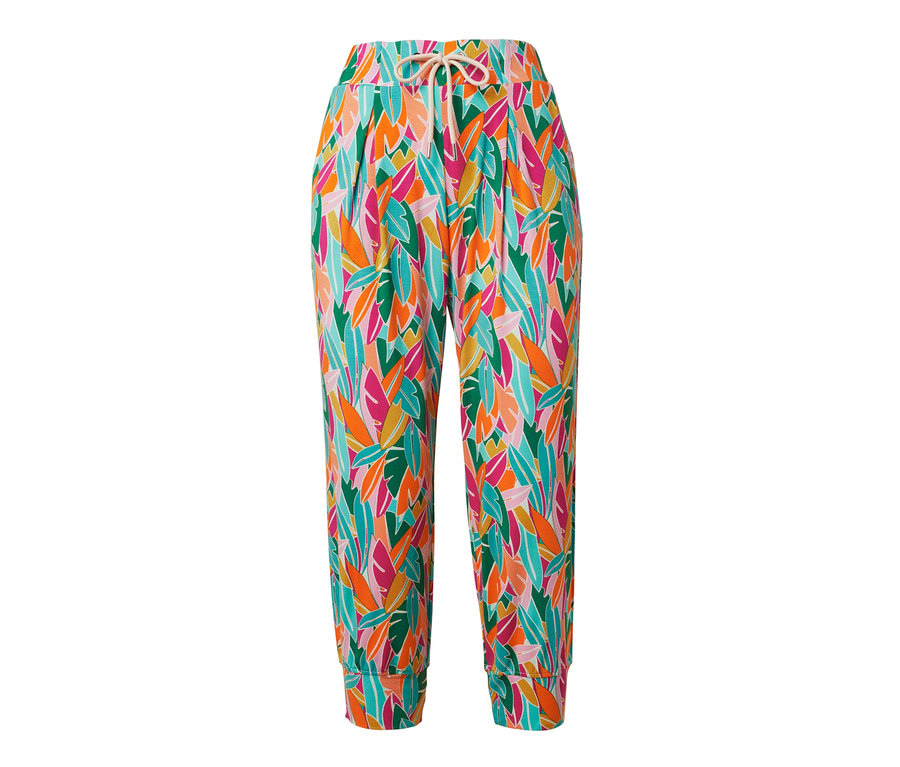 Un pantalon 3/4 en jersey avec un motif de feuilles multicolores.