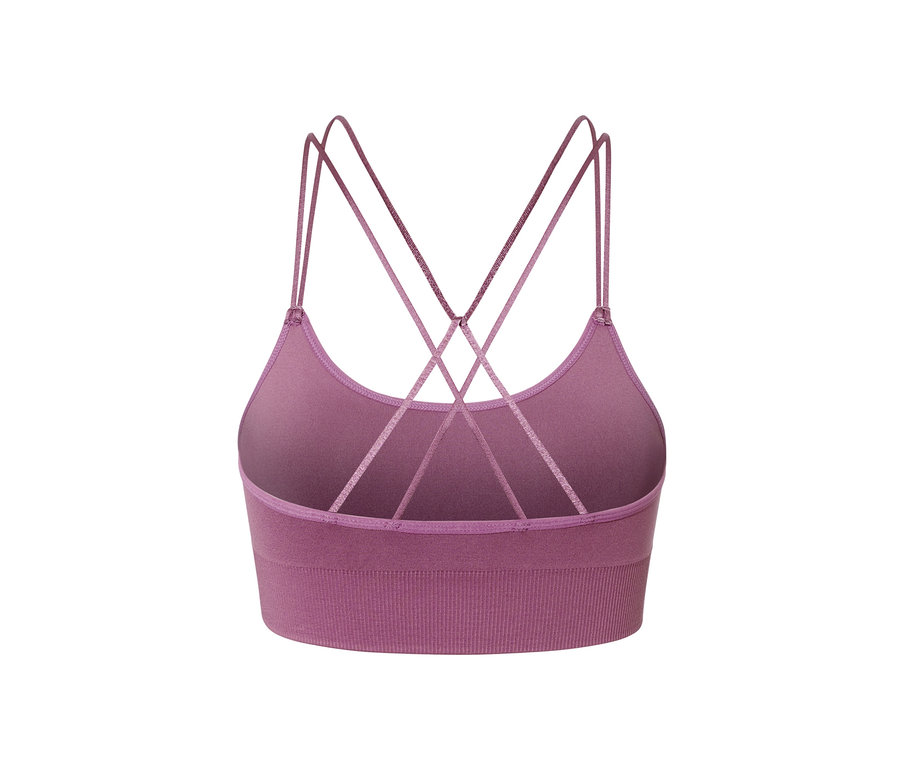 Vue rapprochée de l'arrière d'une brassière de sport violette sans coutures avec des bretelles croisées.