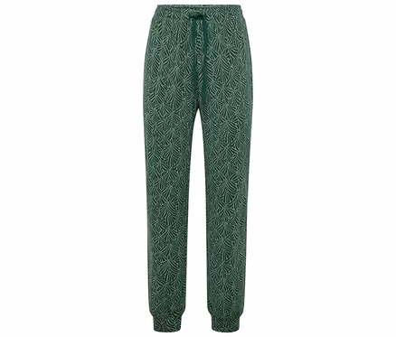 Pantalon de jogging vert avec motif de feuilles claires.