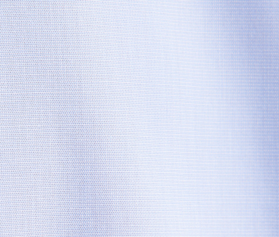 Détail d'un tissu bleu clair.