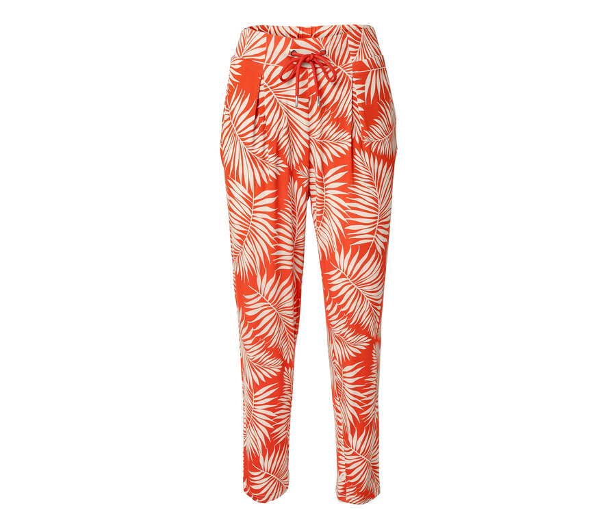 Pantalon en jersey imprimé orange avec motif de feuilles.