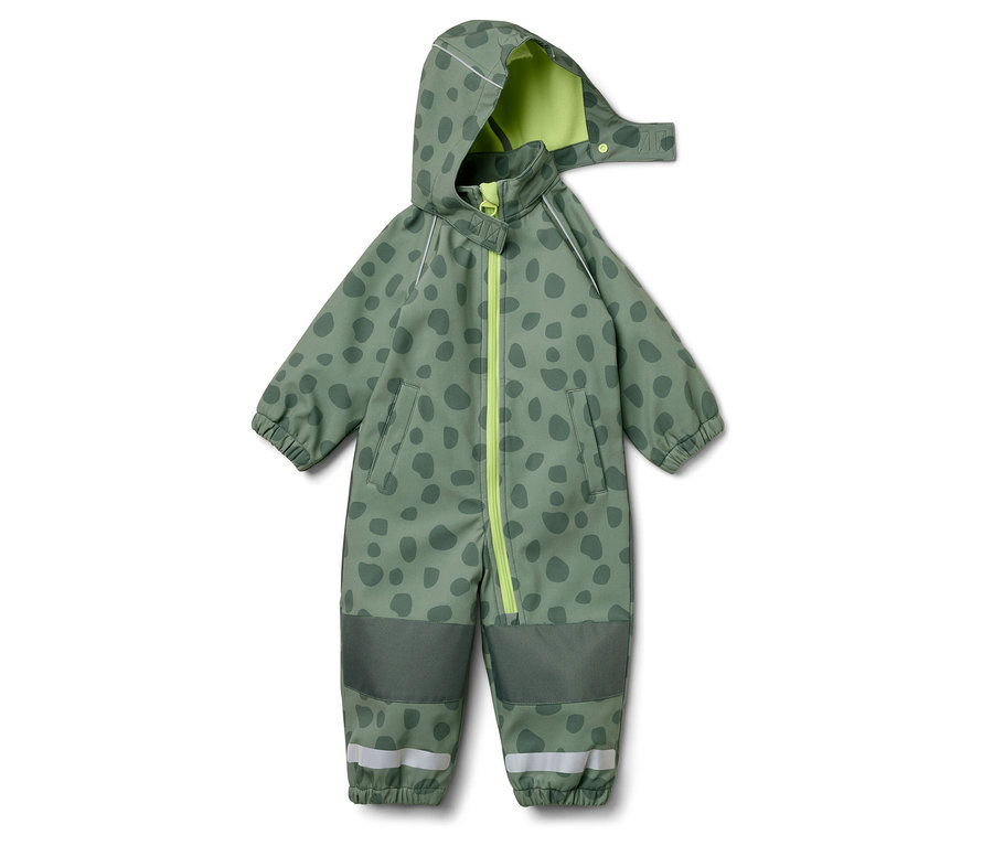 Une combinaison verte à capuche avec des pois vert foncé, une fermeture éclair jaune et un intérieur de capuche vert clair.