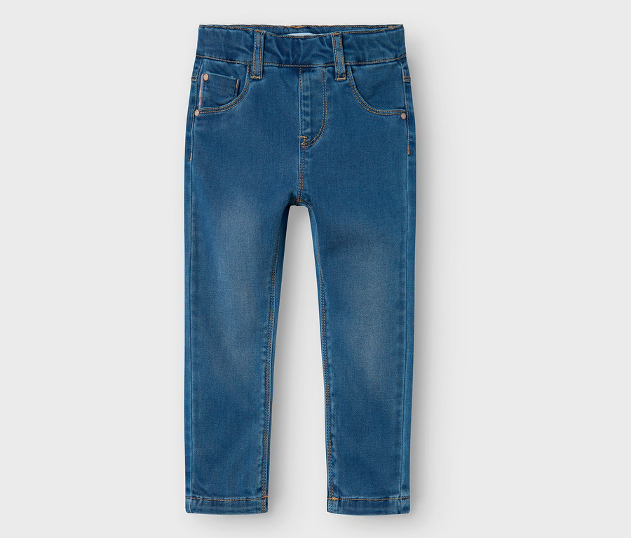 Un jegging NAME IT bleu sur fond blanc.