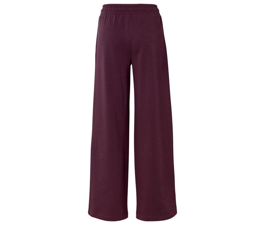 Un pantalon long bordeaux avec une jambe large et une taille élastique.