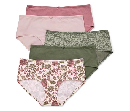 Cinq culottes en coton rose, vert et à motifs floraux sont superposées.